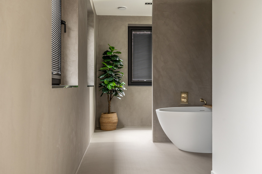 Lavasteen gietvloer in badkamer