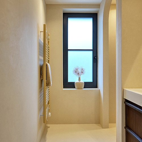 Gietvloer badkamer - Nomadhome